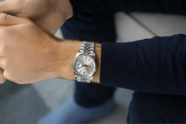 Man wearing Rolex Datejust luxury watch on his wrist