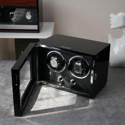 Two watches in a watch winder box