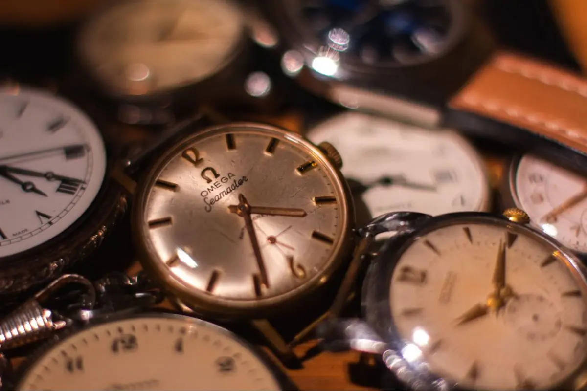 Omega Seamaster and other watches piled together